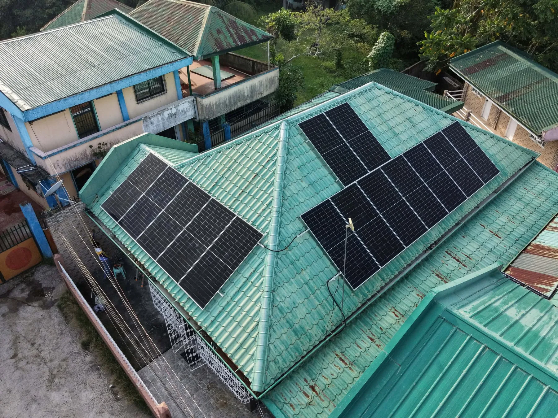 Completed rooftop solar panel installation in Basud