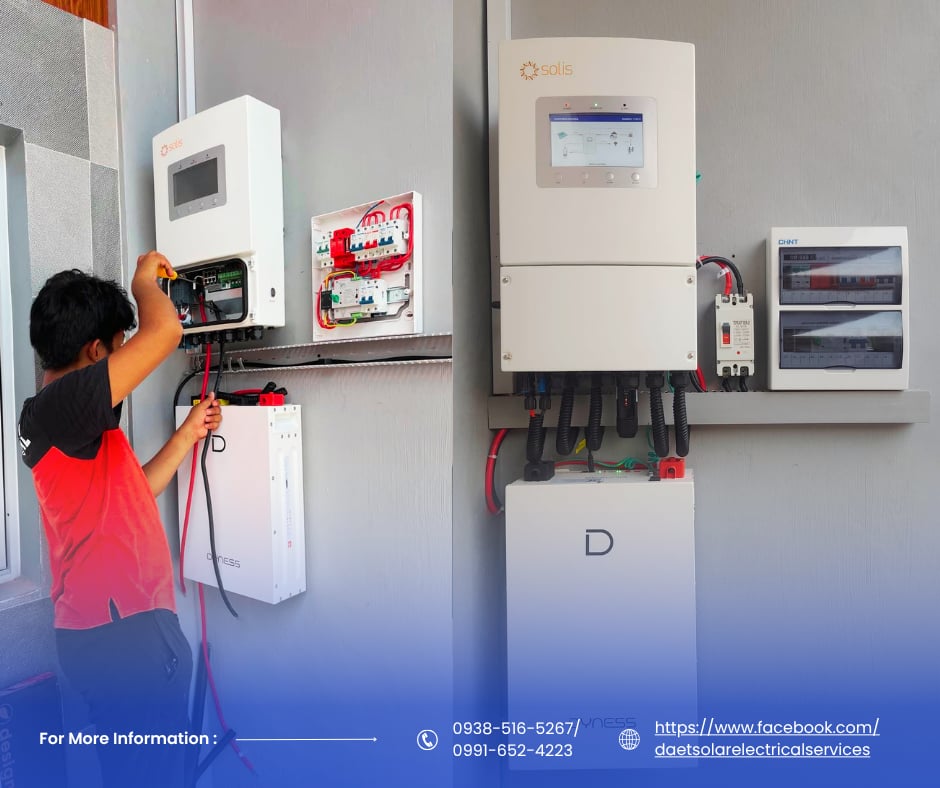 Daet Solar technician wiring a hybrid solar inverter